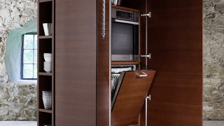Illustration for article titled Philippe Starck Crammed an Entire Kitchen into These Space-Saving Towers